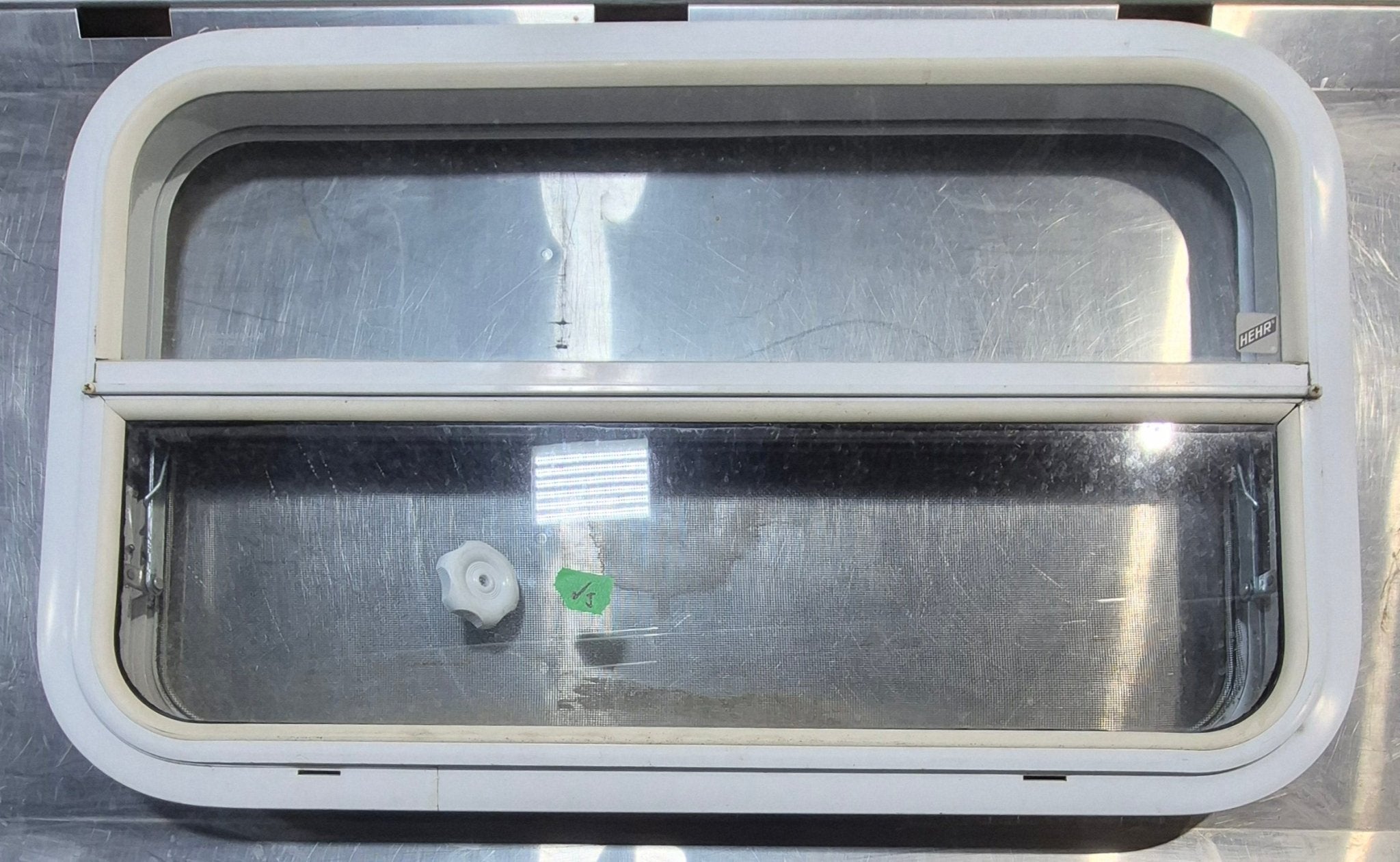 Used White Radius Opening Window : 29 1/2" W x 17 1/2" H x 1 7/8" D - Young Farts RV Parts