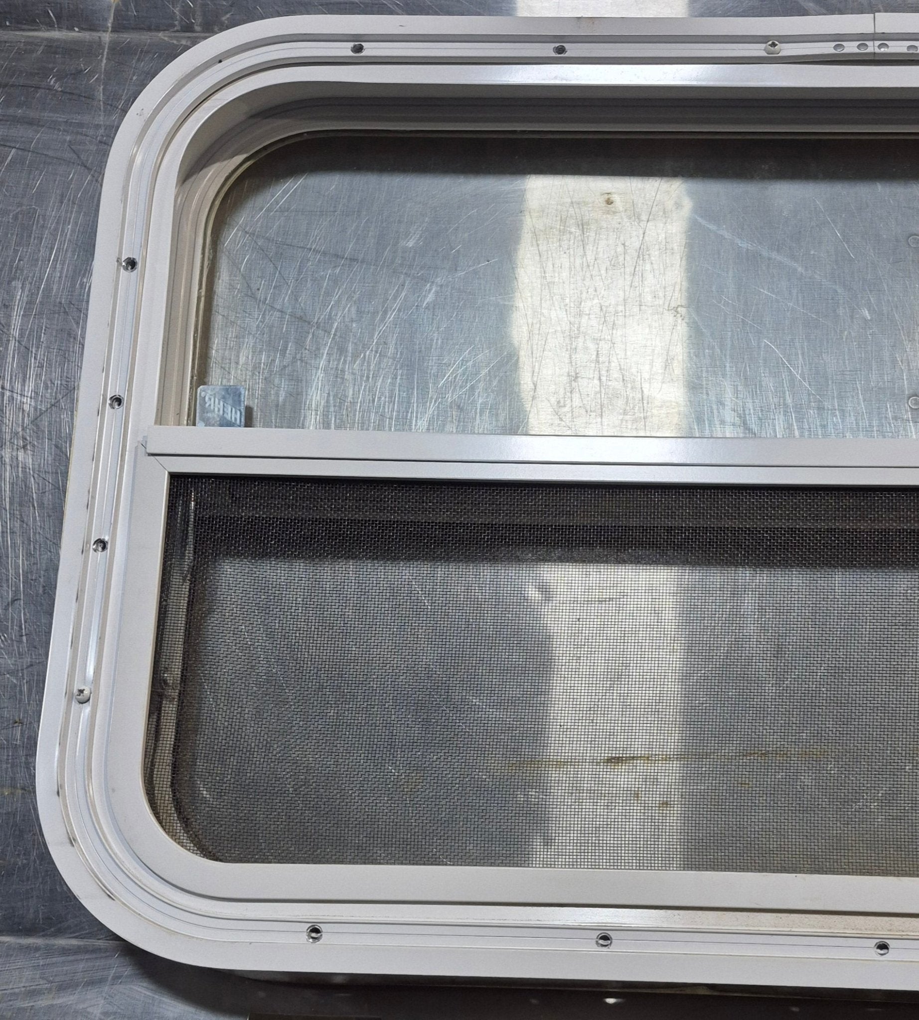 Used White Radius Opening Window : 29 1/2" W x 17 1/2" H x 1 7/8" D - Young Farts RV Parts