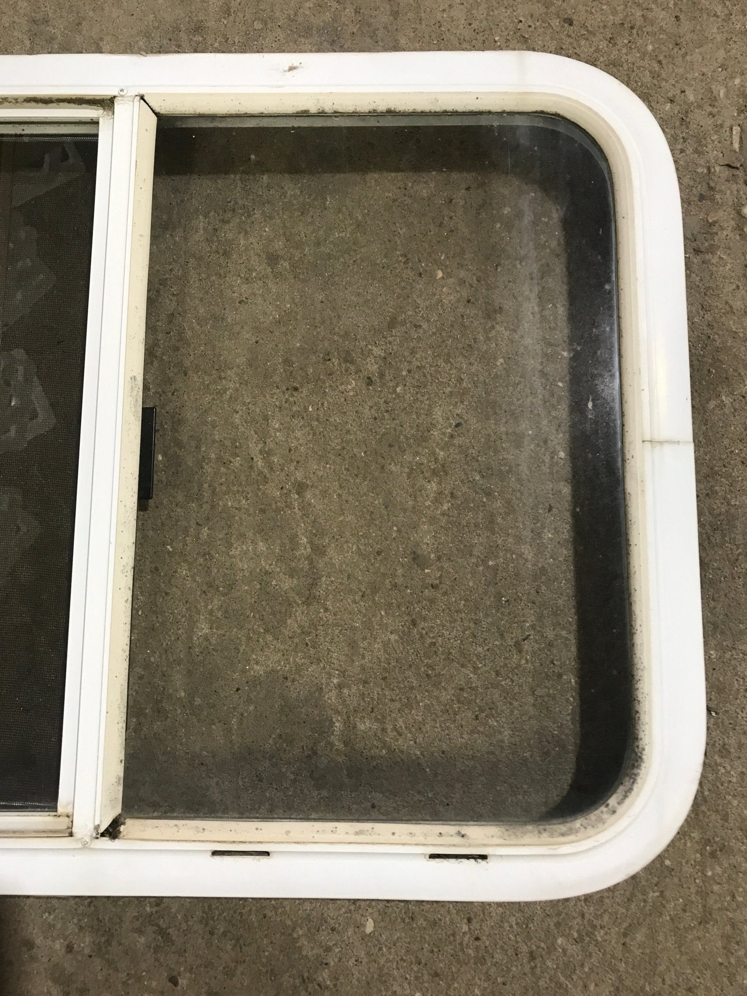 Used White Radius Opening Window : 29 1/2" W x 21 1/2" H x 1 7/8" D - Young Farts RV Parts