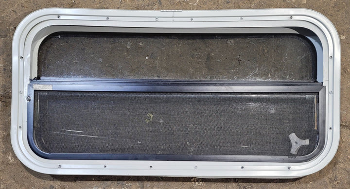 Used White Radius Opening Window : 29 1/4" W x 14 1/4" H x 1 3/4" D - Young Farts RV Parts