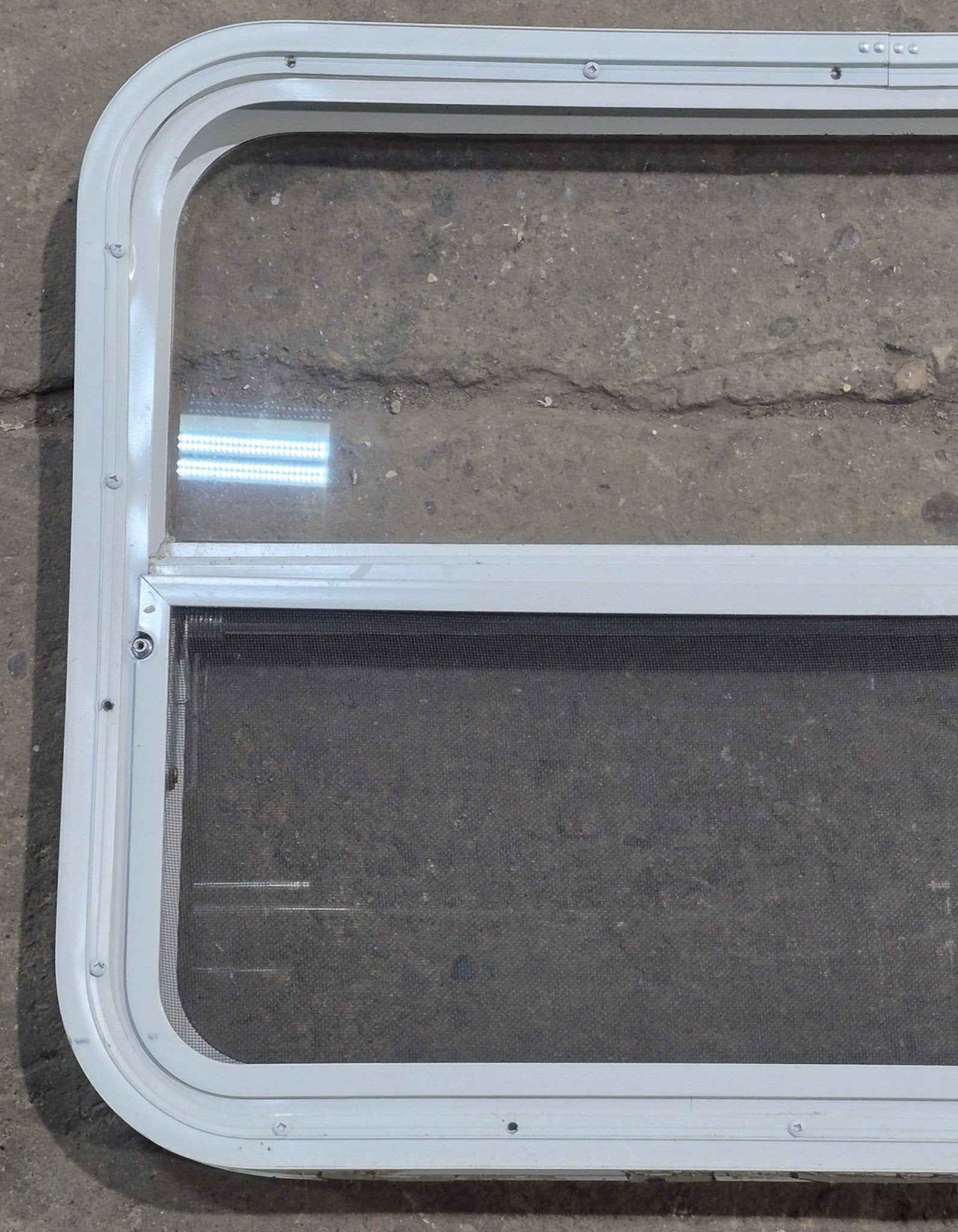 Used White Radius Opening Window : 29 1/4" W x 21 1/4" H x 1 3/4" D - Young Farts RV Parts