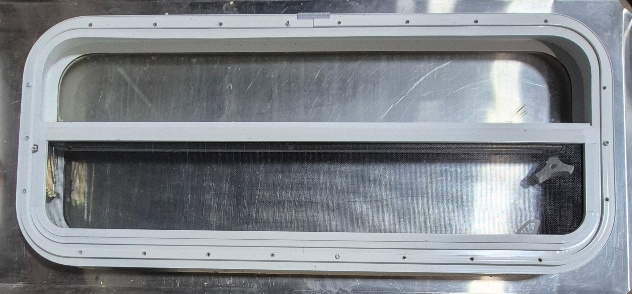 Used White Radius Opening Window : 35 1/2" W x 14 1/4" H x 1 1/4" D - Young Farts RV Parts