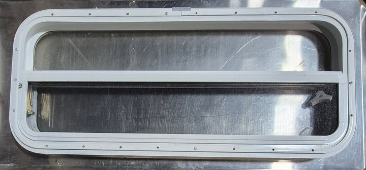 Used White Radius Opening Window : 35 1/2" W x 14 1/4" H x 1 1/4" D - Young Farts RV Parts