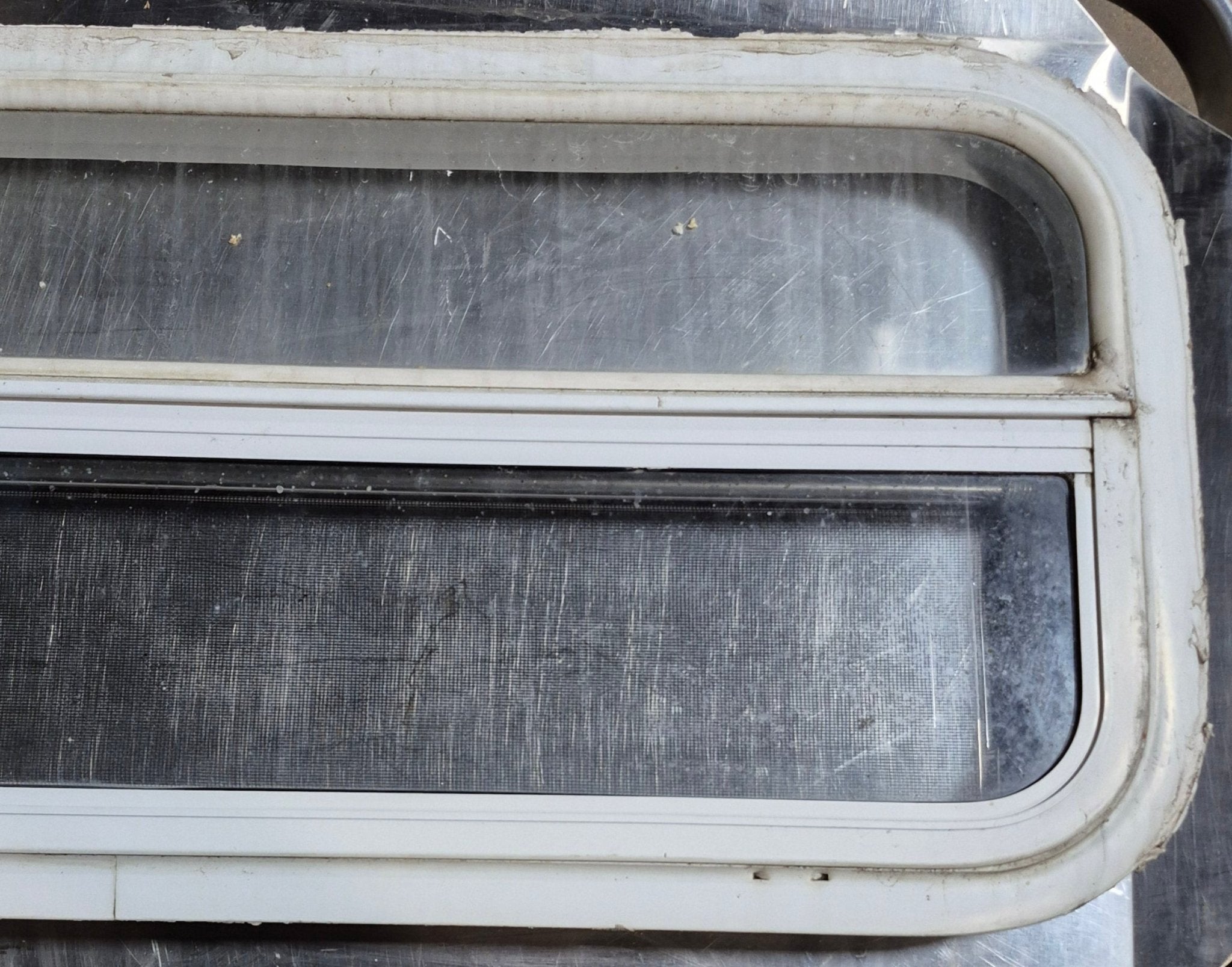 Used White Radius Opening Window : 35 1/2" W x 14 1/4" H x 1 1/4" D - Young Farts RV Parts