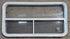 Used White Radius Opening Window : 41 1/4" W x 21 1/4" H x 1 7/8" D - Young Farts RV Parts