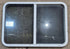 Used White Radius Opening Window : 41 1/4" W x 28 3/4" H x 1 7/8" D - Young Farts RV Parts