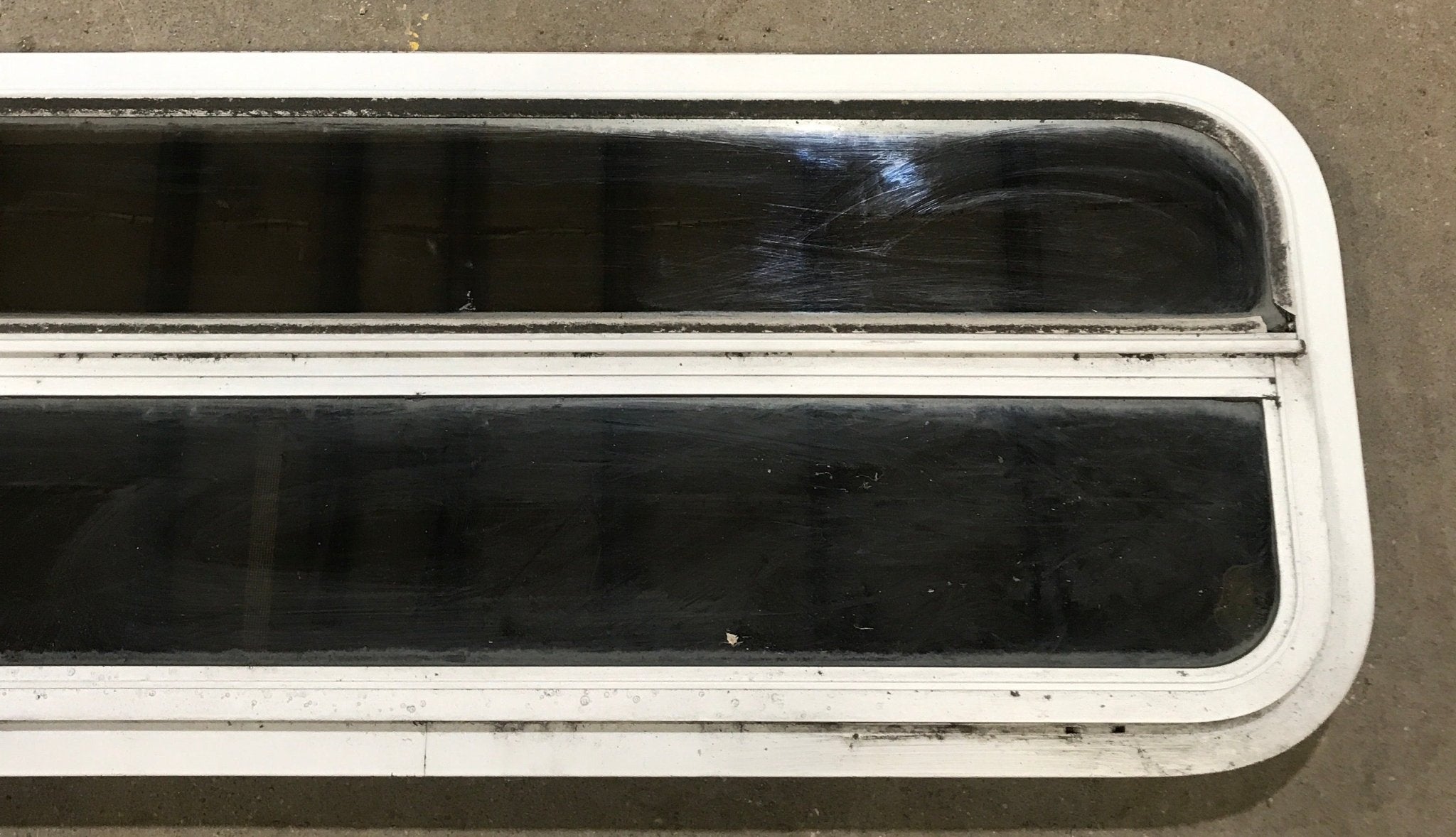 Used White Radius Opening Window : 47 1/2" W x 14 1/2" H x 1 7/8" D - Young Farts RV Parts