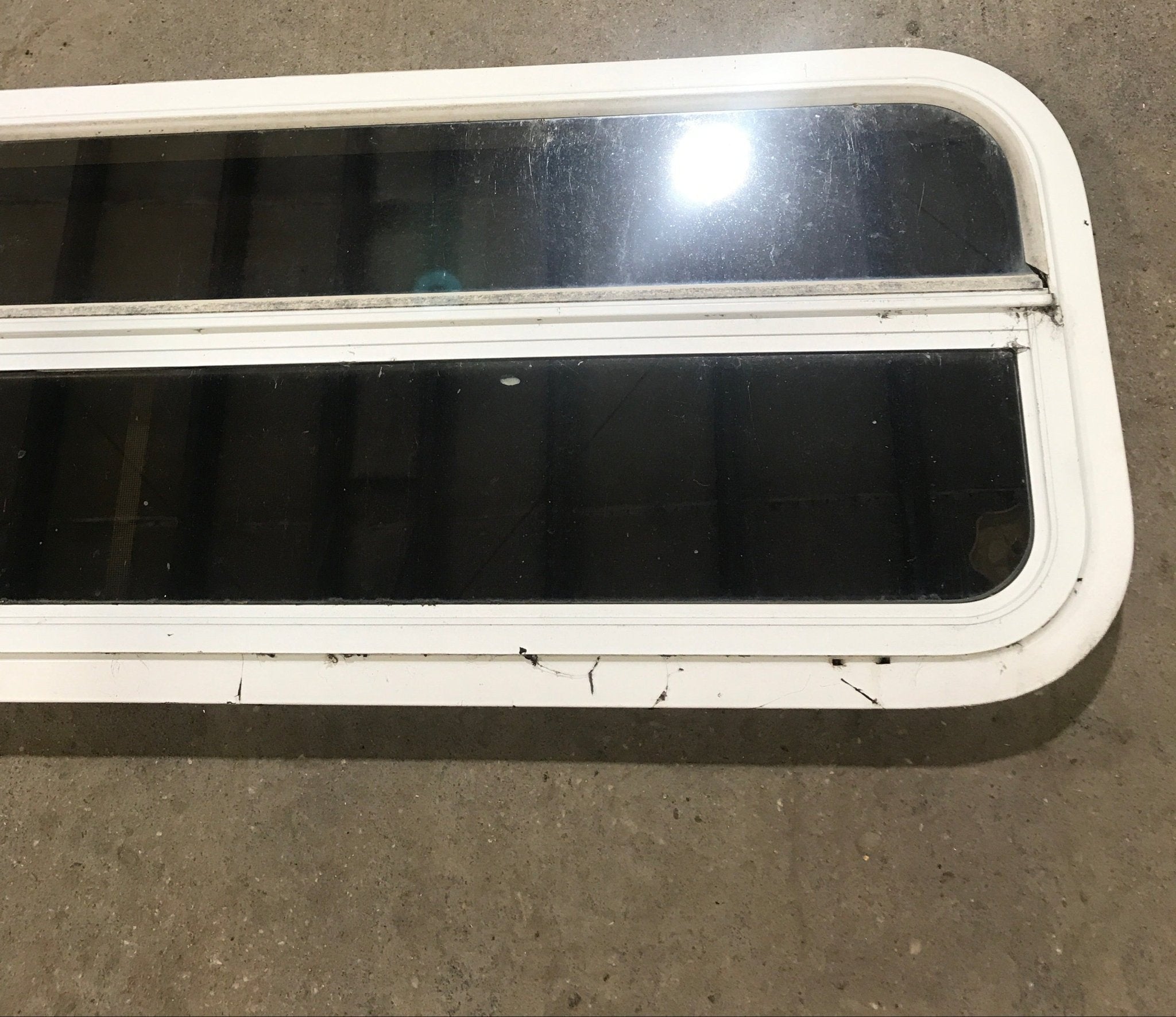 Used White Radius Opening Window : 47 1/2" W x 14 1/2" H x 1 7/8" D - Young Farts RV Parts