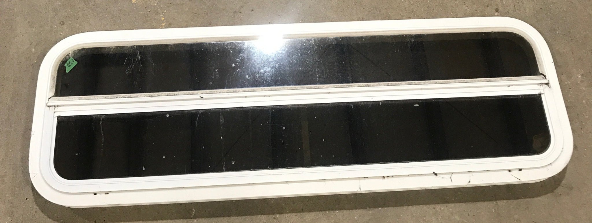 Used White Radius Opening Window : 47 1/2" W x 14 1/2" H x 1 7/8" D - Young Farts RV Parts