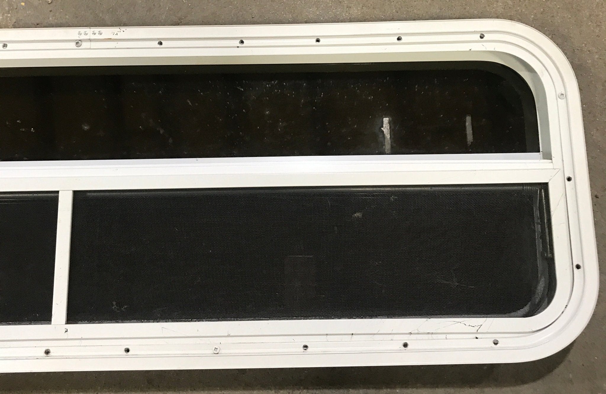 Used White Radius Opening Window : 47 1/2" W x 14 1/2" H x 1 7/8" D - Young Farts RV Parts