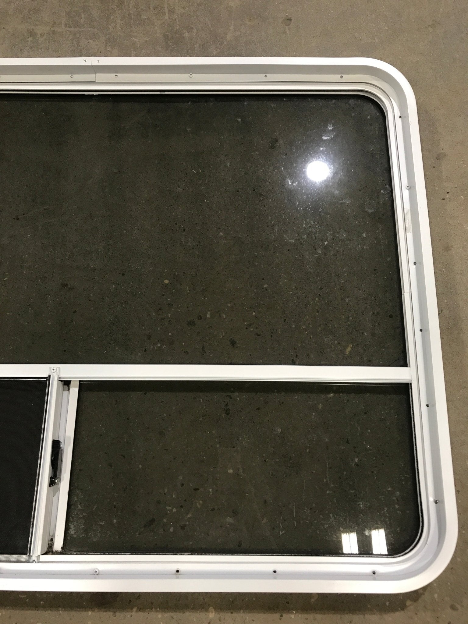 Used White Radius Opening Window : 48 1/4" W x 35 3/4" H x 2" D - Young Farts RV Parts