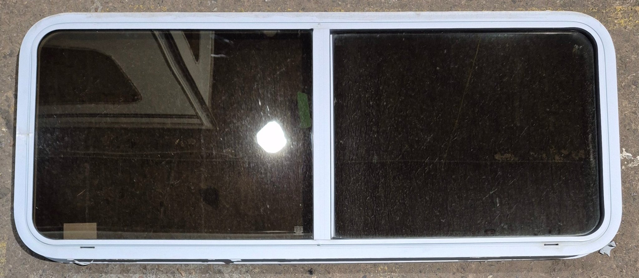 Used White Radius Opening Window : 54 1/4" W x 21 3/4" H x 1 7/8" D - Young Farts RV Parts