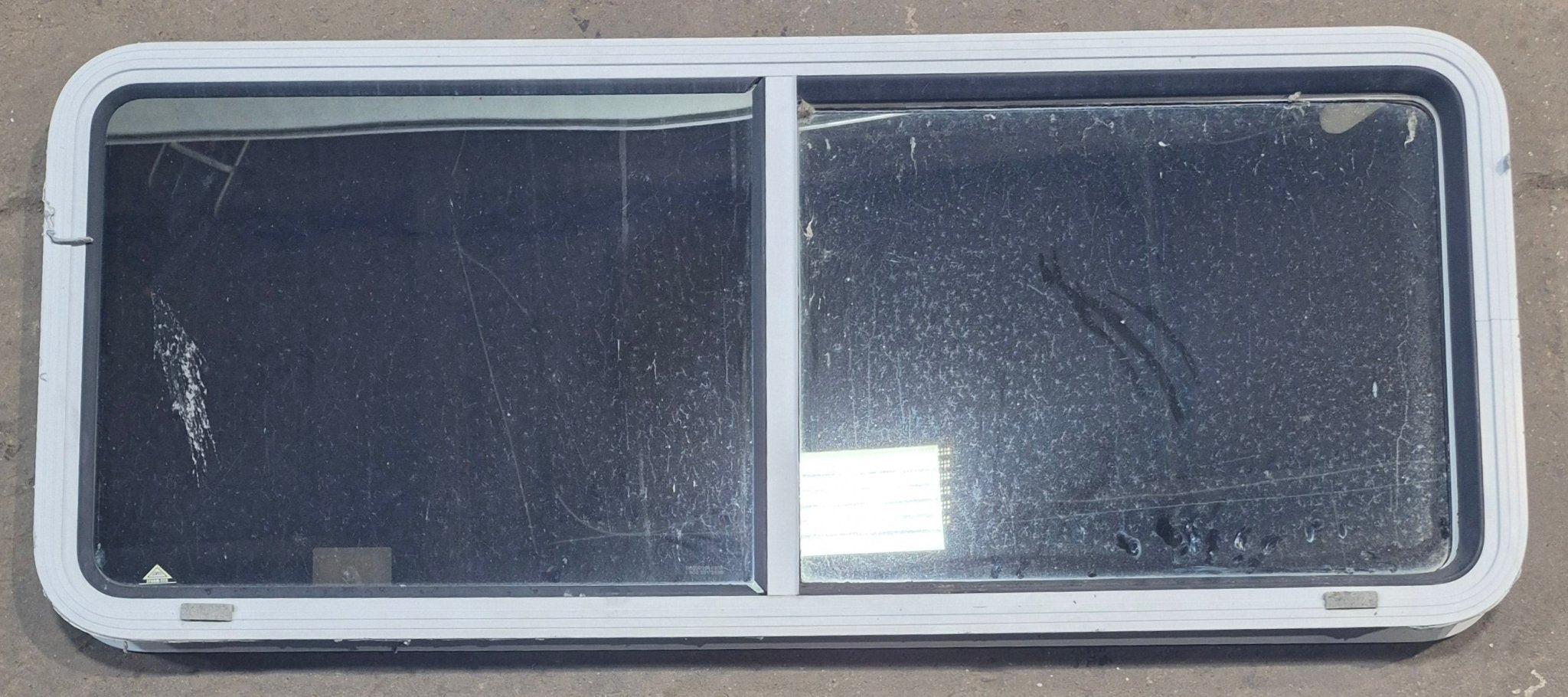 Used White Radius Opening Window : 54" W x 21 1/2" H x 1 7/8" D - Young Farts RV Parts