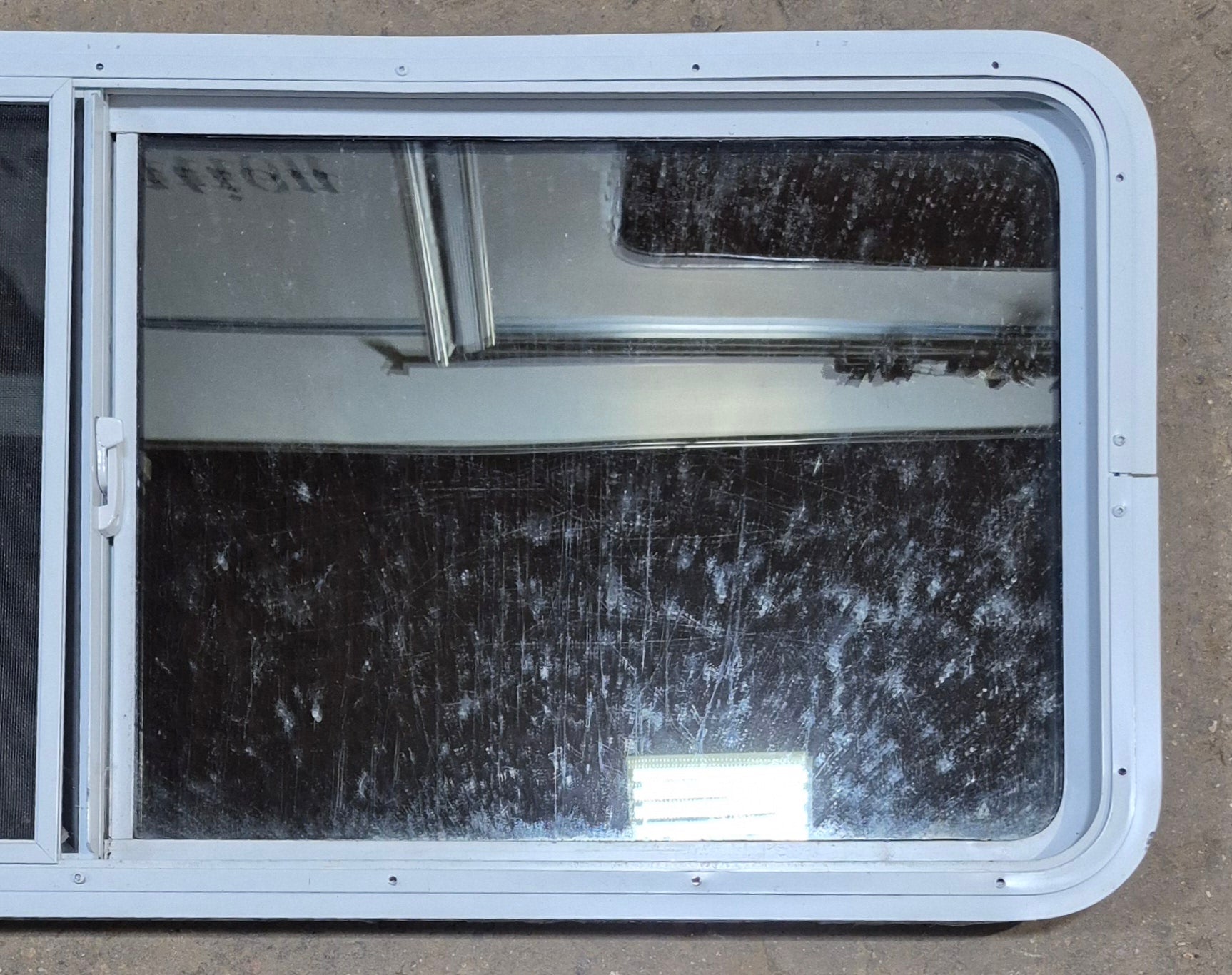 Used White Radius Opening Window : 54" W x 21 1/2" H x 1 7/8" D - Young Farts RV Parts