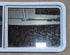 Used White Radius Opening Window : 54" W x 21 1/2" H x 1 7/8" D - Young Farts RV Parts