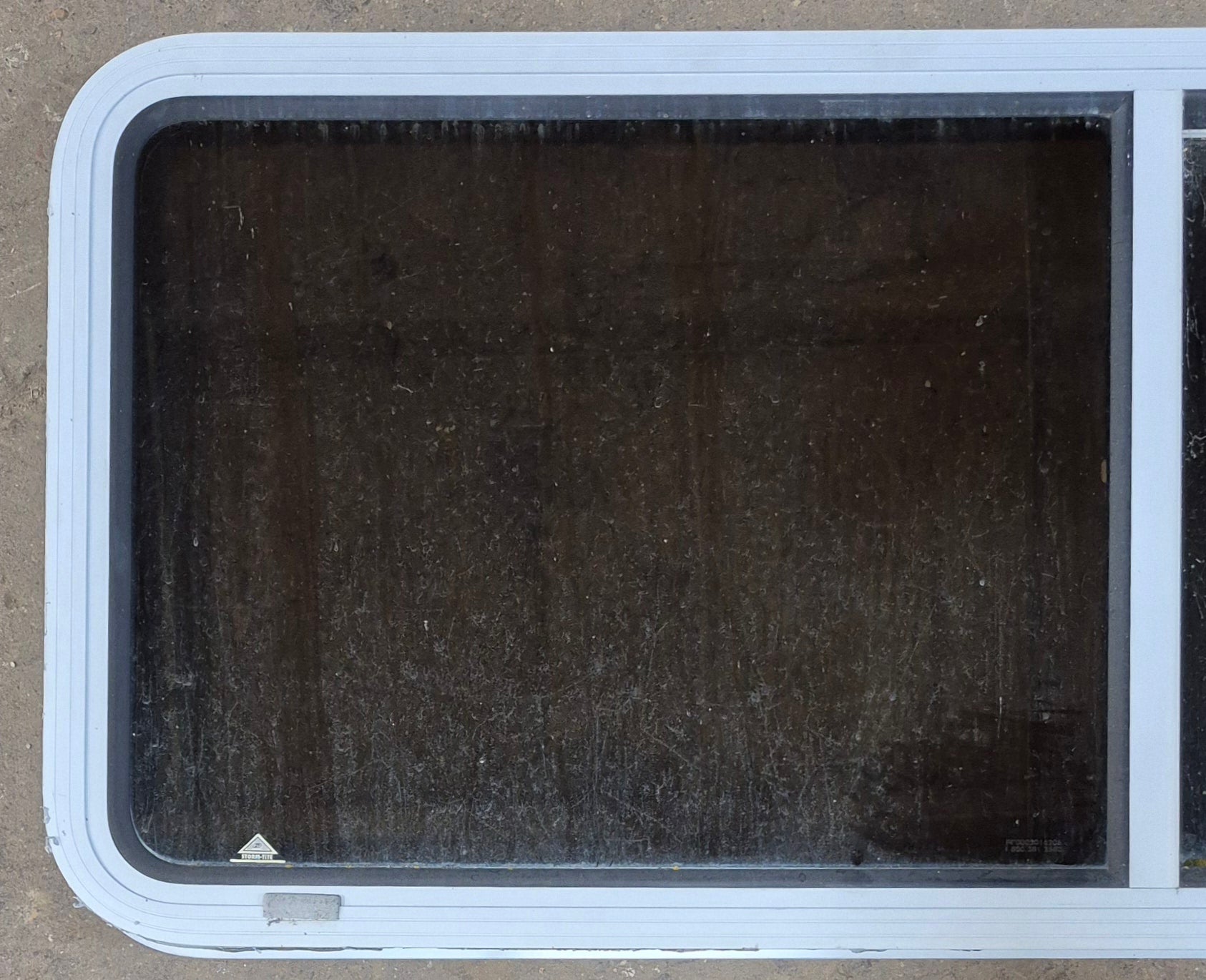 Used White Radius Opening Window : 54" W x 21 1/2" H x 1 7/8" D - Young Farts RV Parts