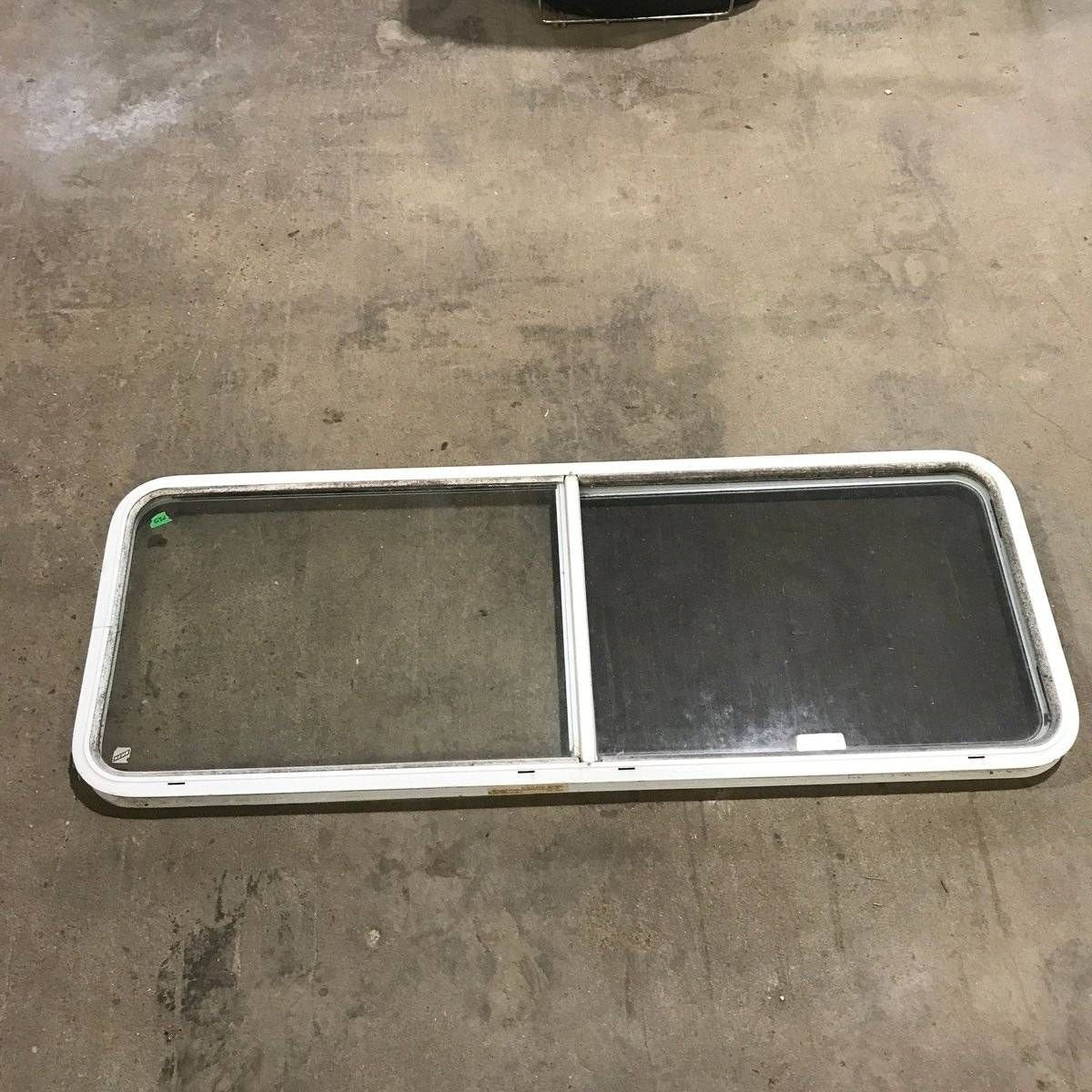Used White Radius Opening Window - 60.25 X 21.75 X 1.875 - Young Farts RV Parts