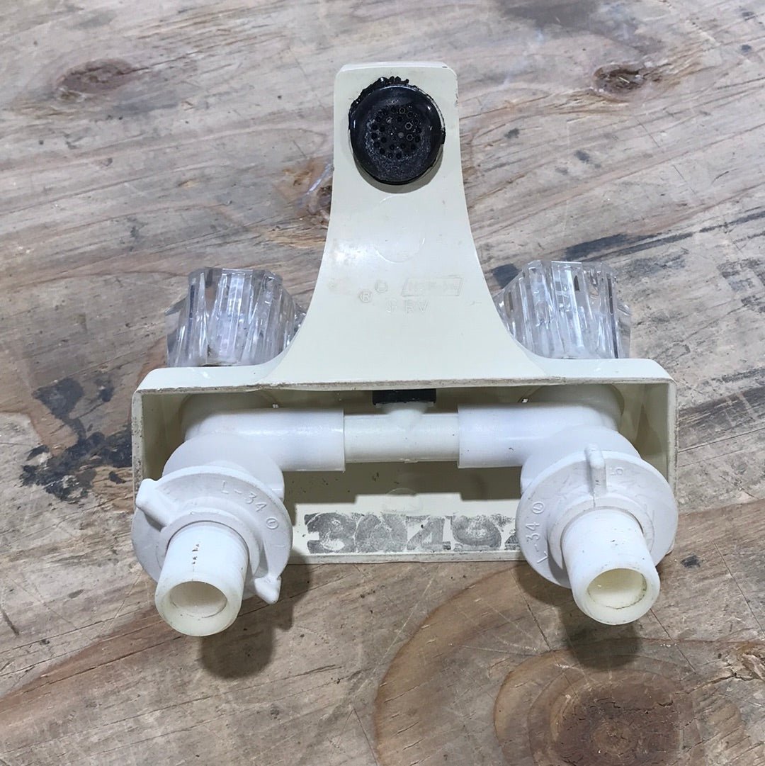 Used 4" Bathroom Faucet Bone - Young Farts RV Parts