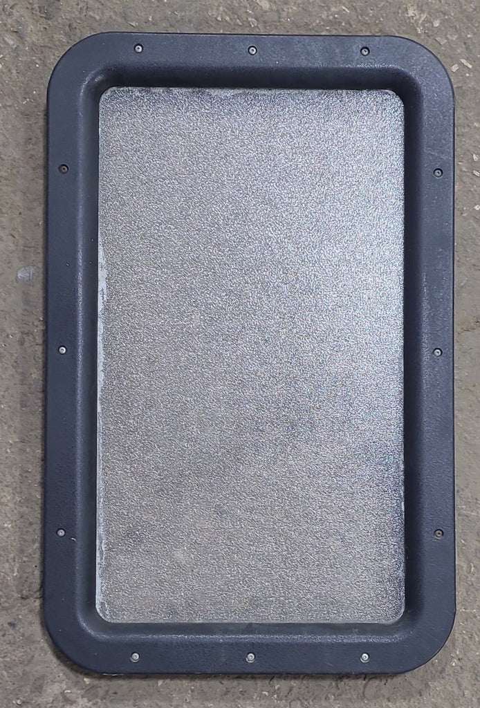 Used Black Entry door window : 24 3/4" x 15 3/4" - Young Farts RV Parts