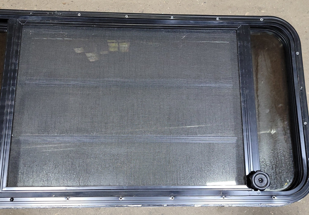Used Black Radius Emergency Opening Window : 21 3/4" H X 60" W X 2" D - Young Farts RV Parts