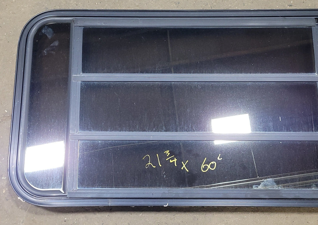 Used Black Radius Emergency Opening Window : 21 3/4" H X 60" W X 2" D - Young Farts RV Parts