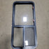 Used Black Radius Emergency Opening Window : 21 3/4" X 45 3/4" X 2" D - Young Farts RV Parts