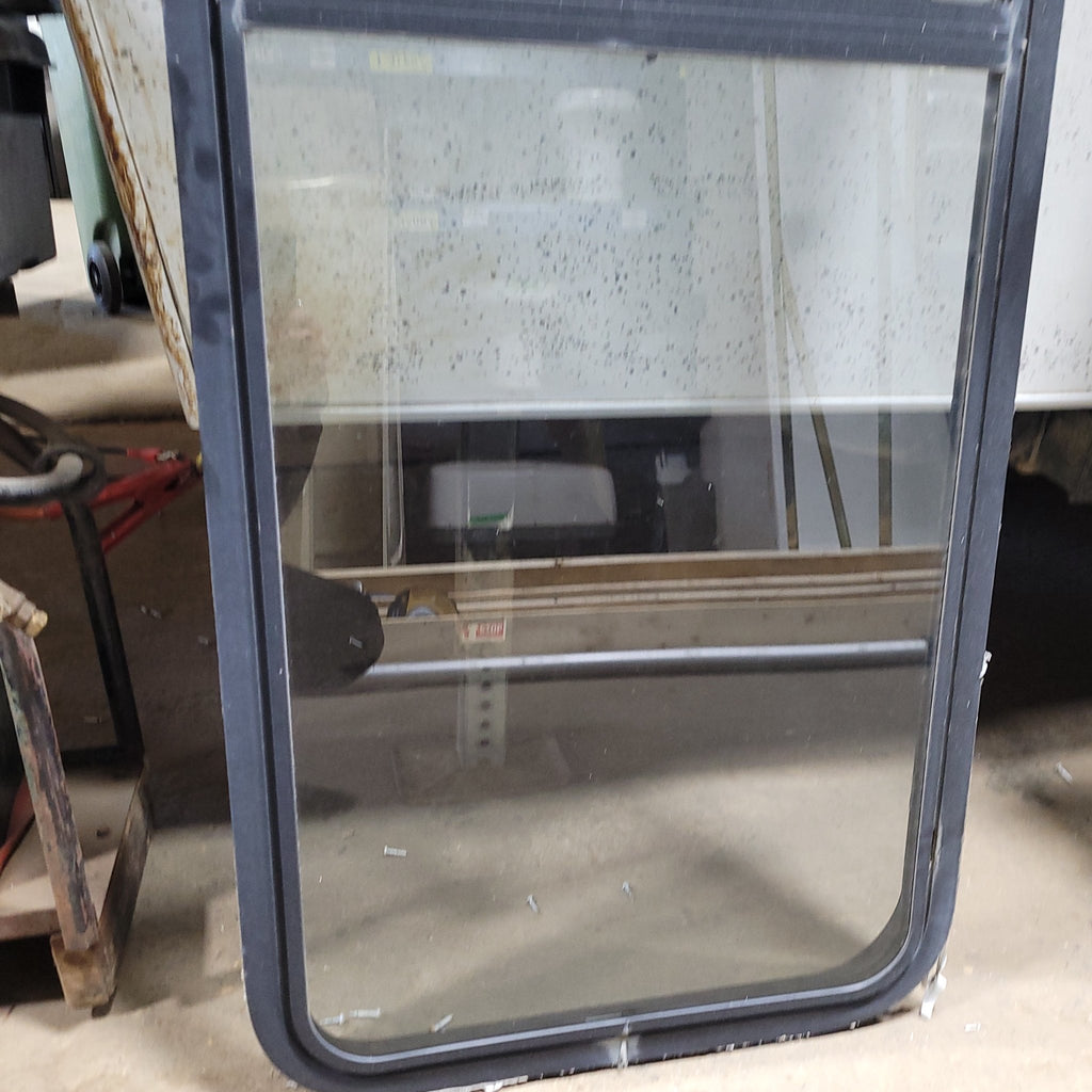 Used Black Radius Emergency Opening Window : 21 3/4" X 60 1/2" X 2" D - Young Farts RV Parts