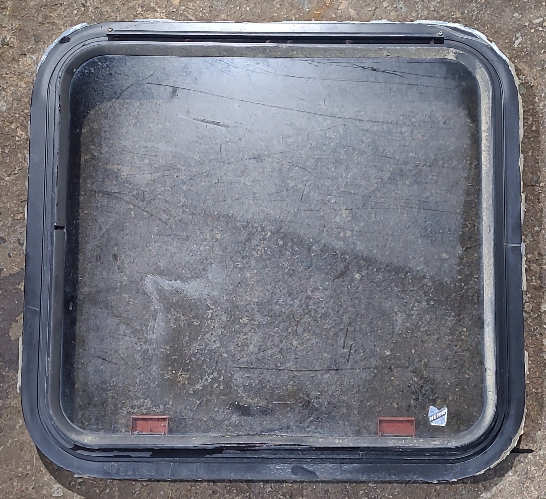 Used Black Radius Emergency Opening Window : 23 1/2" W x 21 3/4" H x 1 3/4" D - Young Farts RV Parts