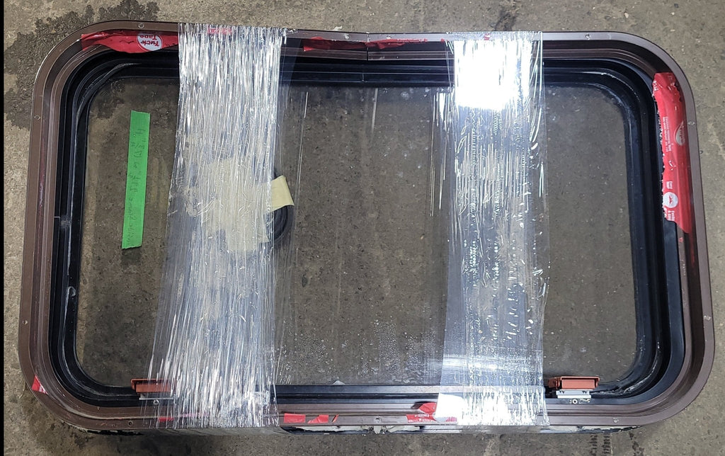 Used Black Radius Emergency Opening Window : 29 1/2" W X 17 3/4" H X 2" D - Young Farts RV Parts