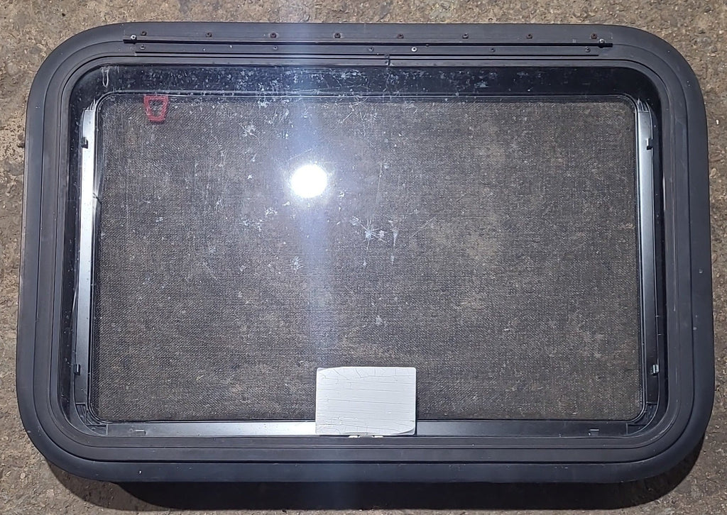 Used Black Radius Emergency Opening Window : 29 1/2" W x 19 1/2" H x 1 3/4" D - Young Farts RV Parts