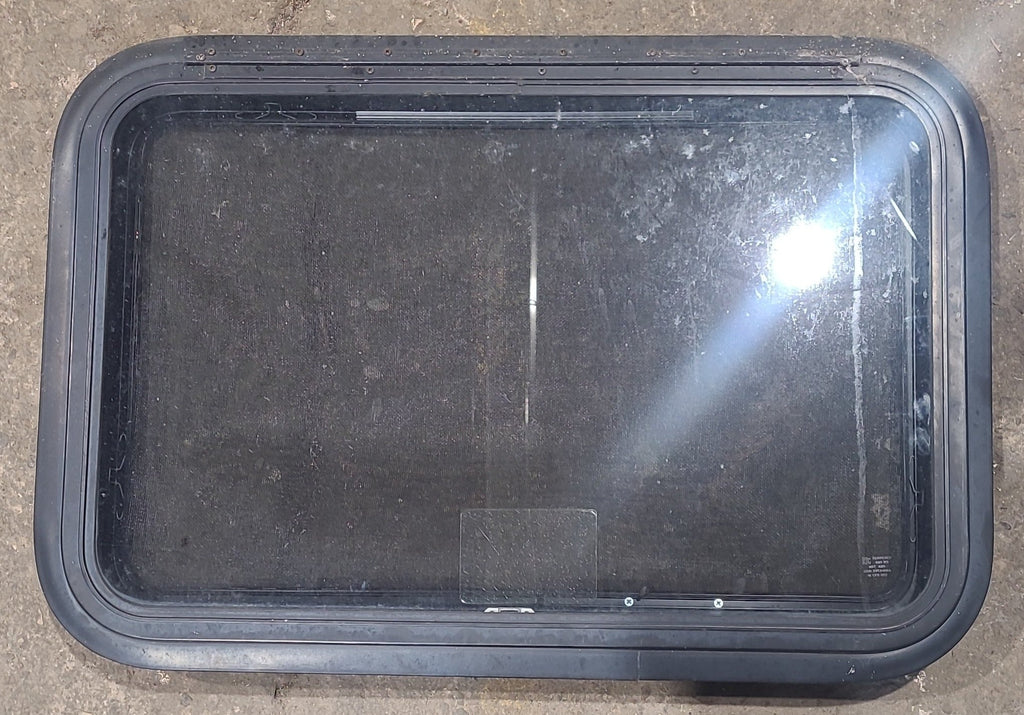 Used Black Radius Emergency Opening Window : 29 1/2" W x 19" H x 1 3/4" D - Young Farts RV Parts