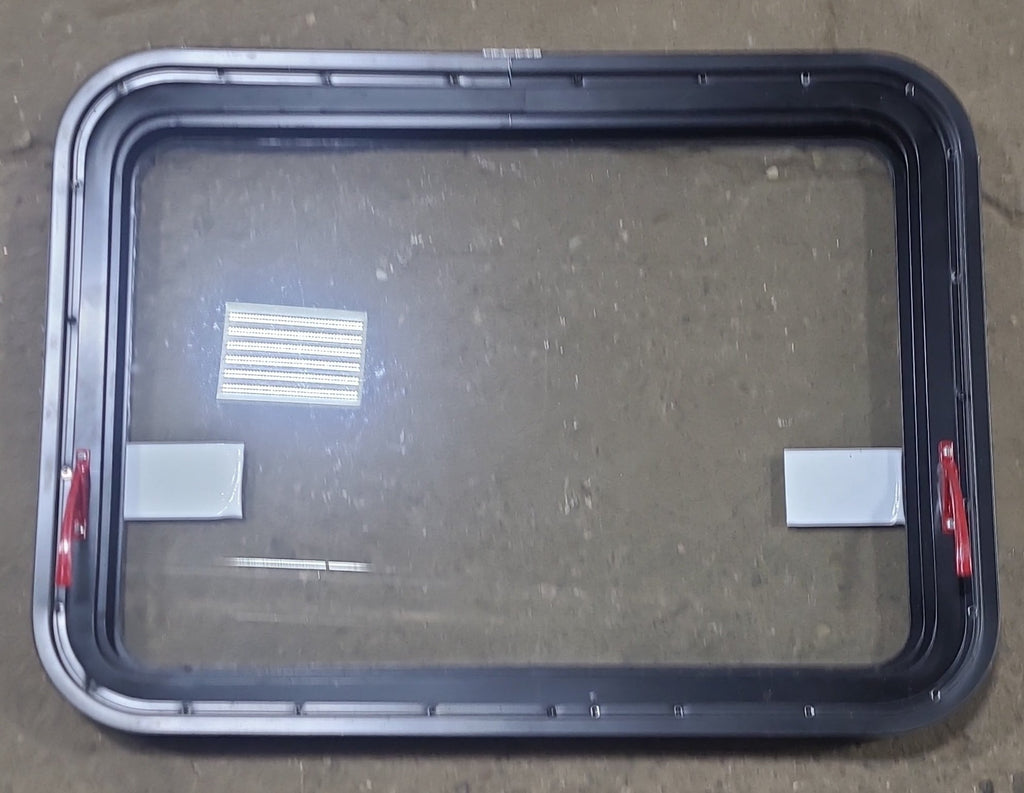 Used Black Radius Emergency Opening Window : 29 1/2" W x 21 1/2" H x 1 3/8" D - Young Farts RV Parts