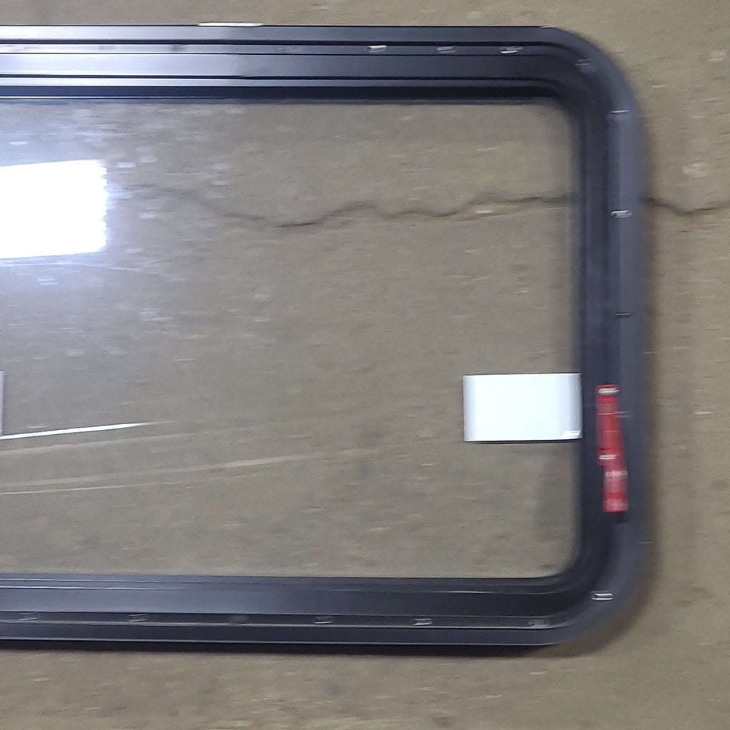 Used Black Radius Emergency Opening Window : 29 1/4" W x 19 1/2" H x 1 1/8" D - Young Farts RV Parts