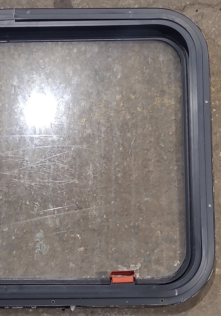 Used Black Radius Emergency Opening Window : 30 1/4" W x 22 1/4" H x 1 1/4" D - Young Farts RV Parts