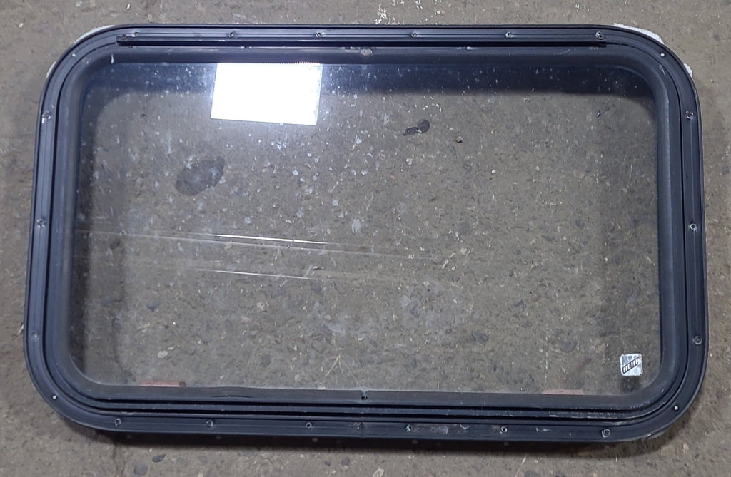 Used Black Radius Emergency Opening Window : 30 3/4" W x 18 3/4" H x 1 5/8" D - Young Farts RV Parts