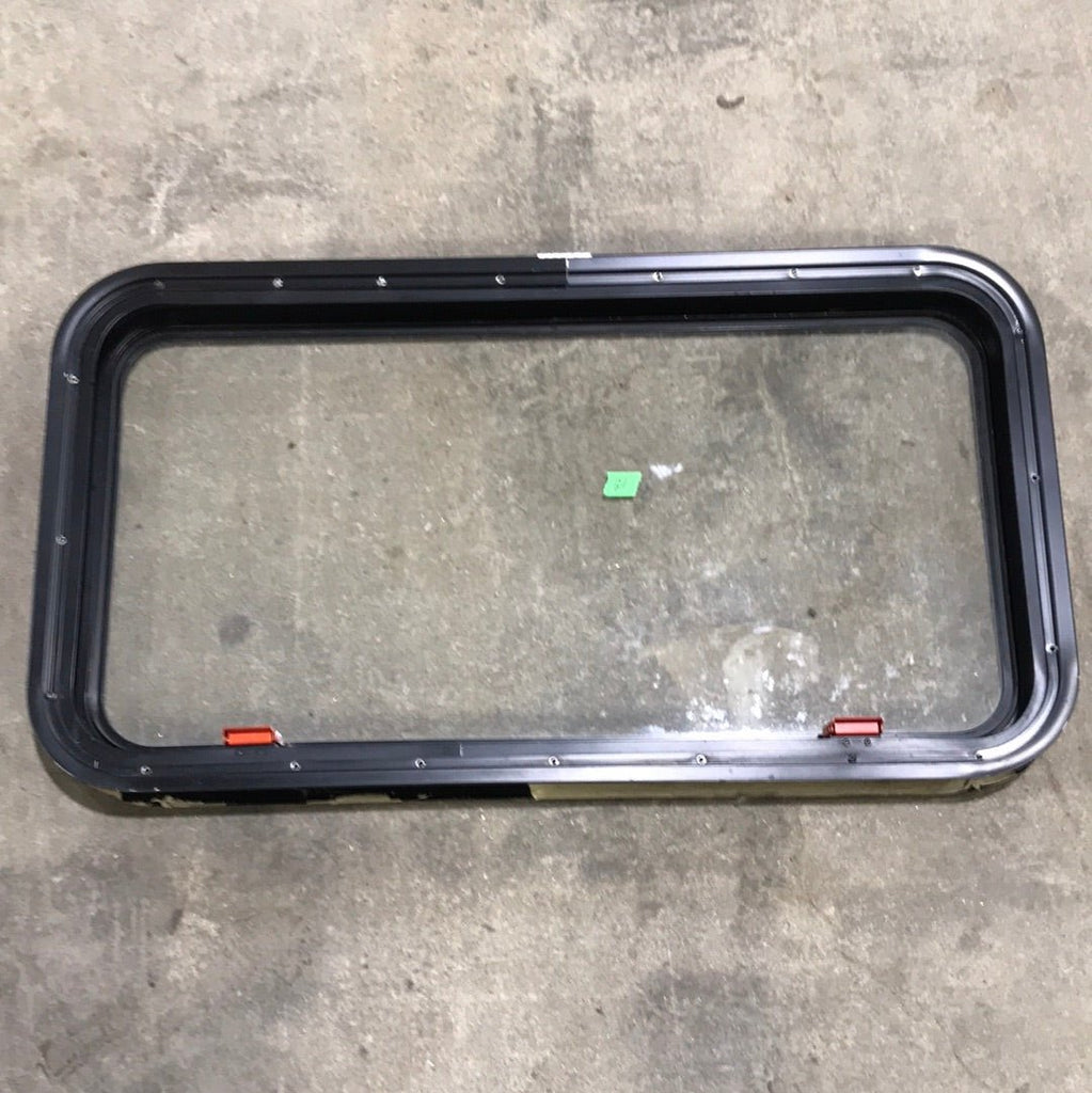 Used Black Radius Emergency Opening Window : 35 1/2" W X 18 1/2" H X 2" D - Young Farts RV Parts