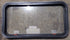 Used Black Radius Emergency Opening Window : 35 1/2" W x 18 3/4" H x 1 3/4" D - Young Farts RV Parts