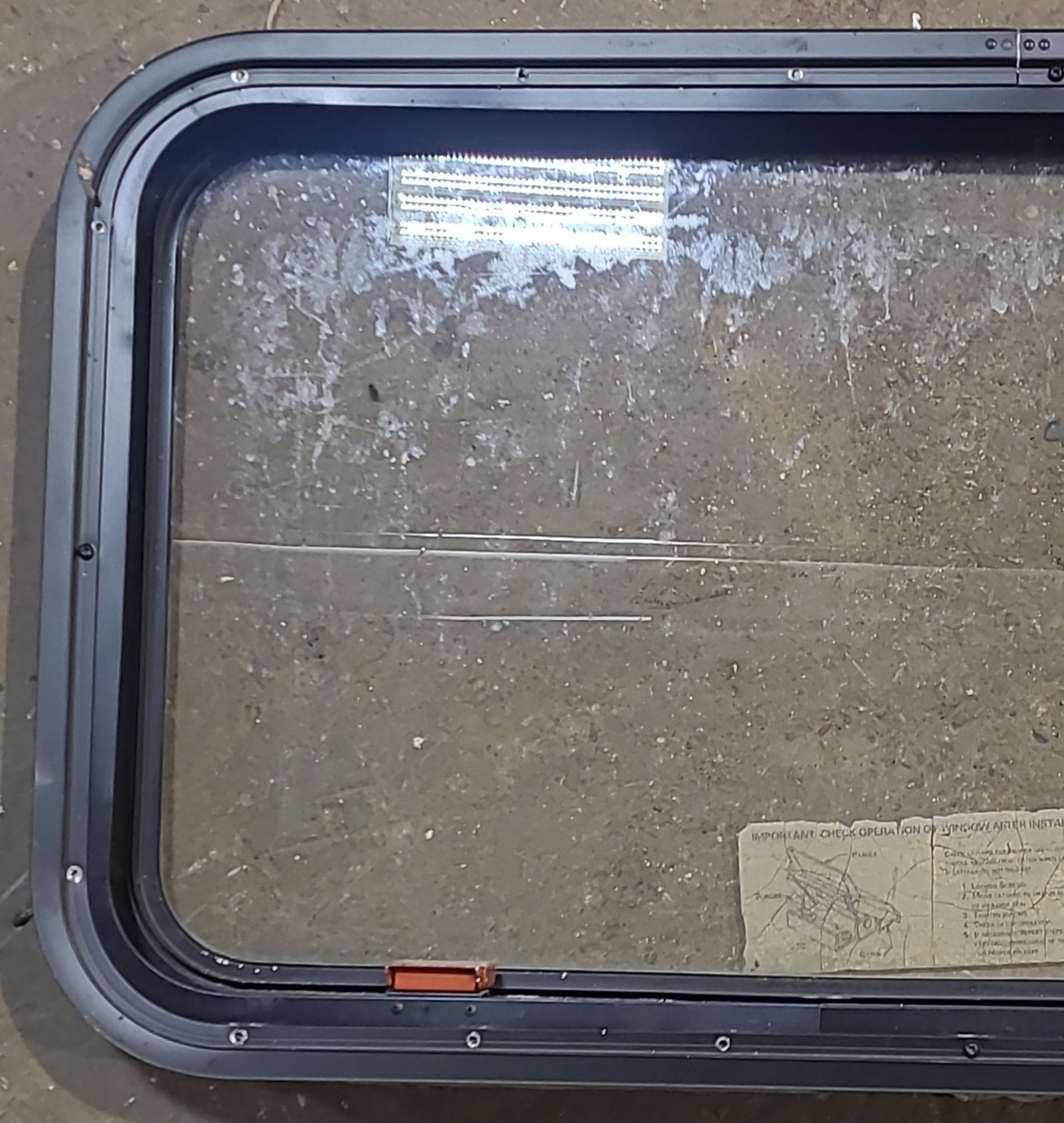 Used Black Radius Emergency Opening Window : 35 1/2" W x 18 3/4" H x 1 3/4" D - Young Farts RV Parts