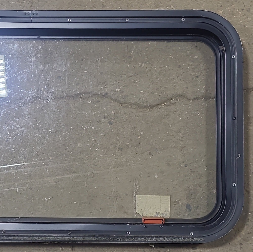 Used Black Radius Emergency Opening Window : 35 1/2" W X 18 3/4" H X 1 3/4" D - Young Farts RV Parts