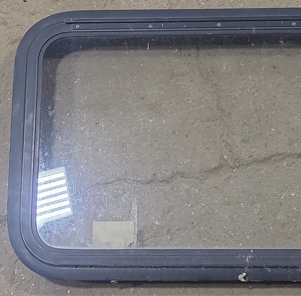 Used Black Radius Emergency Opening Window : 35 1/2" W X 18 3/4" H X 1 3/4" D - Young Farts RV Parts