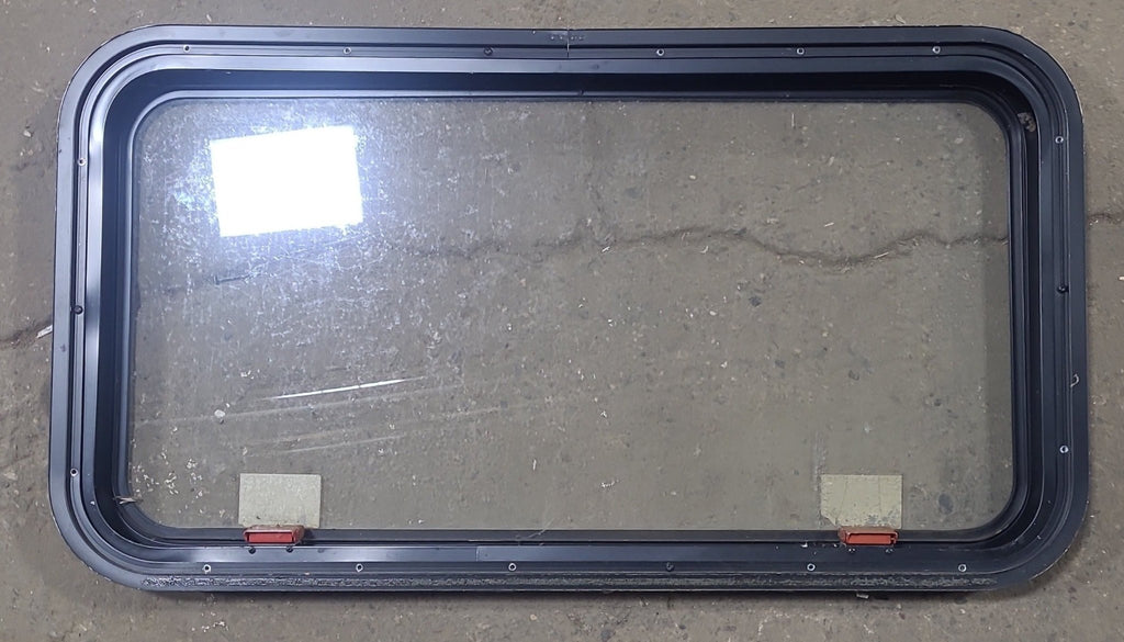 Used Black Radius Emergency Opening Window : 35 1/2" W X 18 3/4" H X 1 3/4" D - Young Farts RV Parts