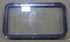 Used Black Radius Emergency Opening Window : 35 1/2" W x 19 1/2" H x 1 1/2" D - Young Farts RV Parts