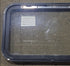 Used Black Radius Emergency Opening Window : 35 1/2" W x 19 1/2" H x 1 1/2" D - Young Farts RV Parts