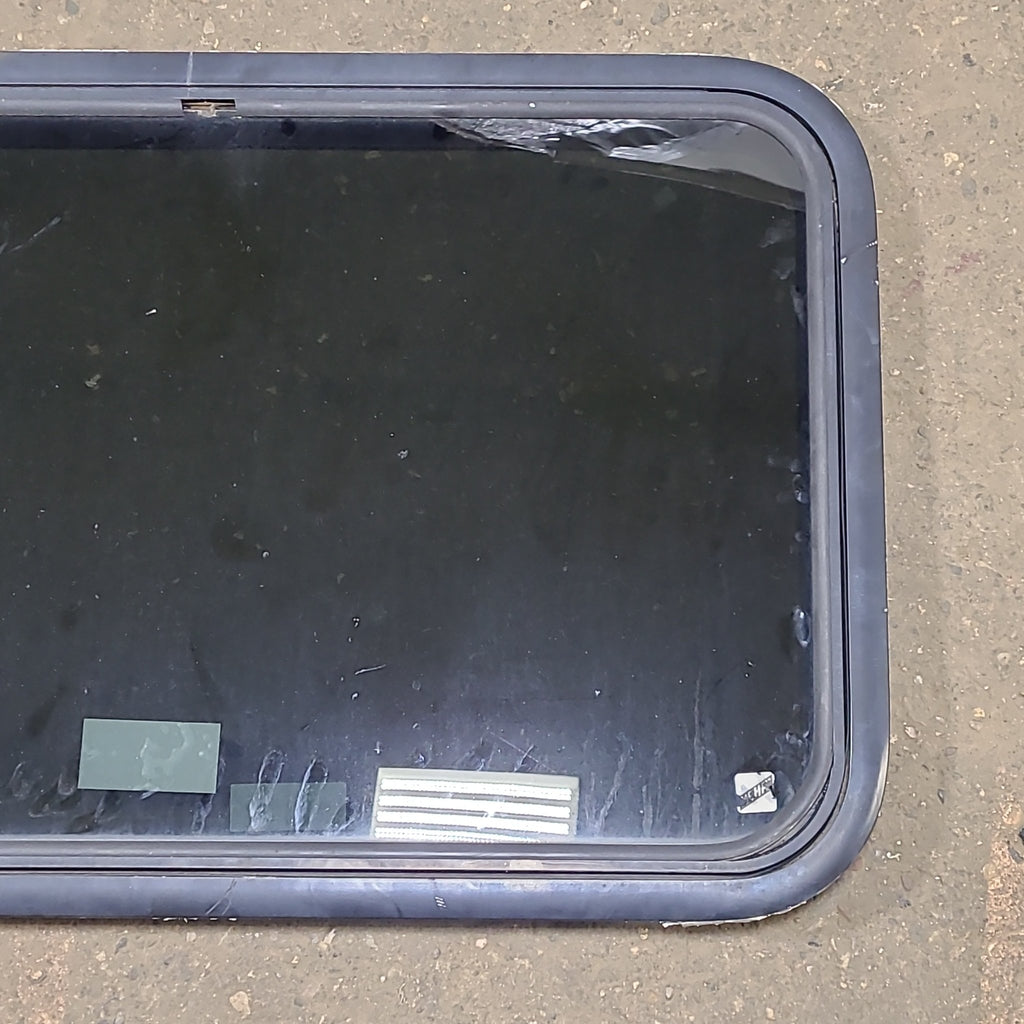 Used Black Radius Emergency Opening Window : 35 1/2" W x 21 1/2" H x 1 1/4" D - Young Farts RV Parts