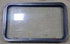 Used Black Radius Emergency Opening Window : 35 1/2" W x 21 1/2" H x 1 7/8" D - Young Farts RV Parts