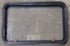 Used Black Radius Emergency Opening Window : 35 1/2" W x 22 1/4" H x 1 7/8" D - Young Farts RV Parts