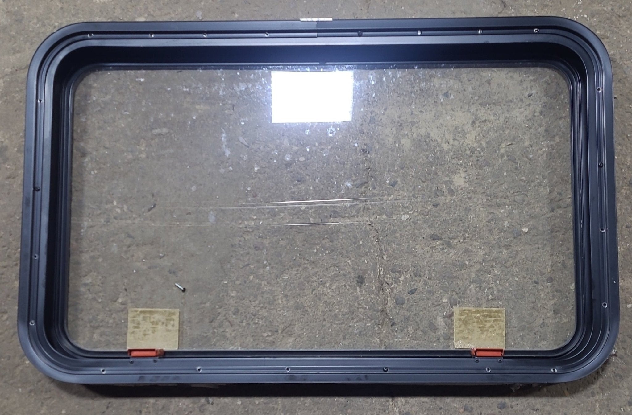 Used Black Radius Emergency Opening Window : 35 1/4" W x 21 1/2" H x 1 7/8" D - Young Farts RV Parts