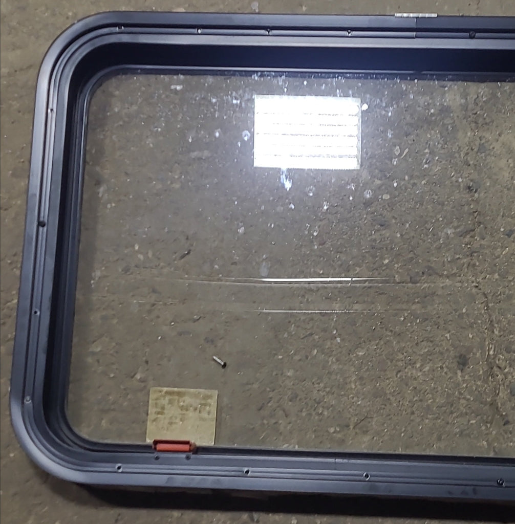 Used Black Radius Emergency Opening Window : 35 1/4" W x 21 1/2" H x 1 7/8" D - Young Farts RV Parts