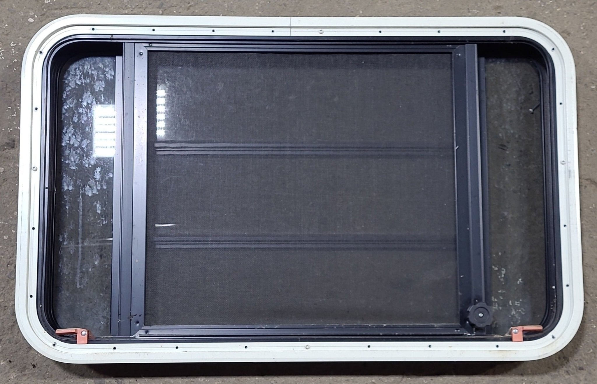 Used Black Radius Emergency Opening Window : 35" W x 21 1/4" H x 1 3/4" D - Young Farts RV Parts