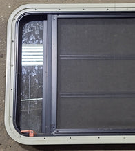 Load image into Gallery viewer, Used Black Radius Emergency Opening Window : 35&quot; W x 21 1/4&quot; H x 1 3/4&quot; D - Young Farts RV Parts